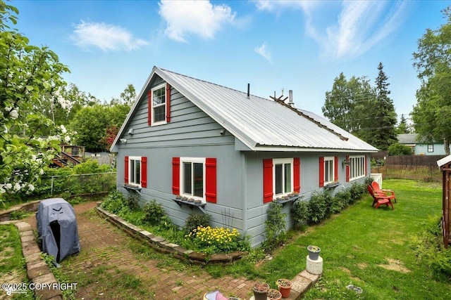 2527 Cottonwood St, Anchorage, AK 99508 - view of home's exterior featuring metal roof