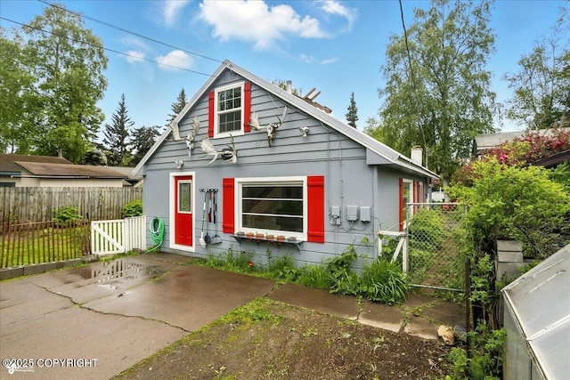 2527 Cottonwood St, Anchorage, AK 99508 - bungalow featuring a gate