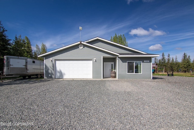 37653 Deville Rd, Soldotna, AK 99669 - view of front of home with an attached garage and driveway