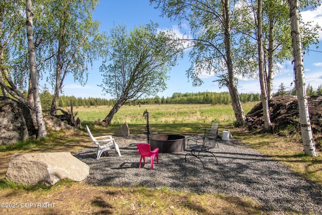 37653 Deville Rd, Soldotna, AK 99669 - view of yard featuring an outdoor fire pit