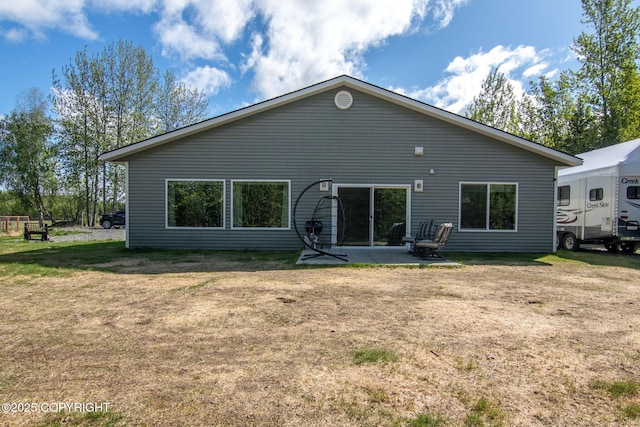 37653 Deville Rd, Soldotna, AK 99669 - rear view of house with a yard and a patio