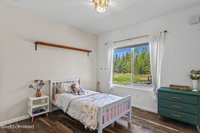 37653 Deville Rd, Soldotna, AK 99669 - bedroom featuring dark wood finished floors and baseboards