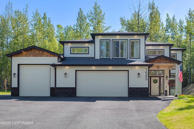 1645 N Vroman Dr, Palmer, AK 99645 - view of front of property with an attached garage and asphalt driveway