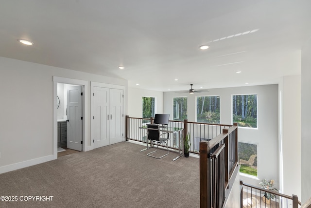 1645 N Vroman Dr, Palmer, AK 99645 - living area featuring an upstairs landing, carpet flooring, recessed lighting, baseboards, and a ceiling fan