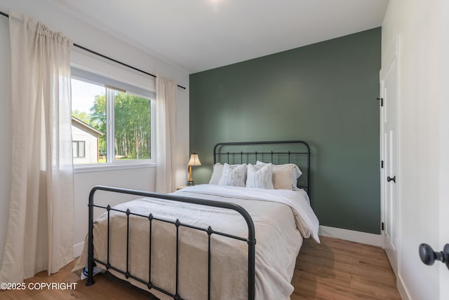 1645 N Vroman Dr, Palmer, AK 99645 - bedroom with wood finished floors and baseboards