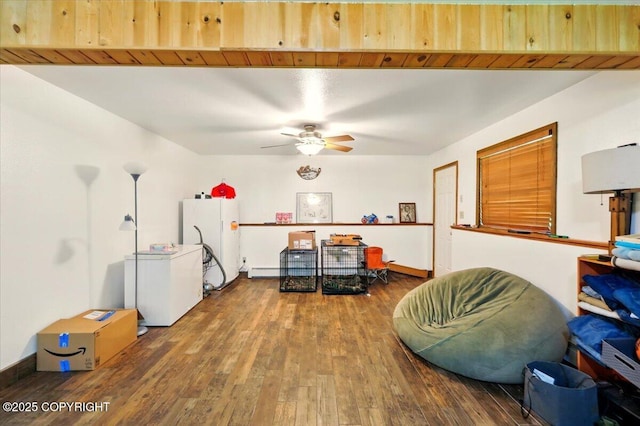 7965 S Settlers Bay Dr, Wasilla, AK 99623 - sitting room featuring wood finished floors, a baseboard radiator, and ceiling fan