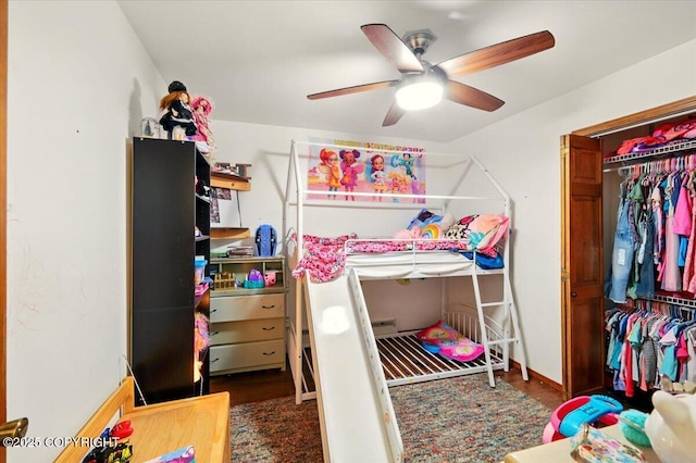 7965 S Settlers Bay Dr, Wasilla, AK 99623 - bedroom with wood finished floors, a closet, and a ceiling fan