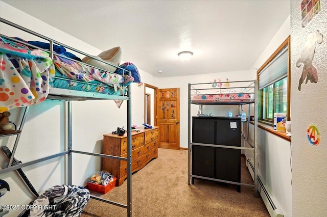 7965 S Settlers Bay Dr, Wasilla, AK 99623 - bedroom featuring carpet floors and a baseboard heating unit
