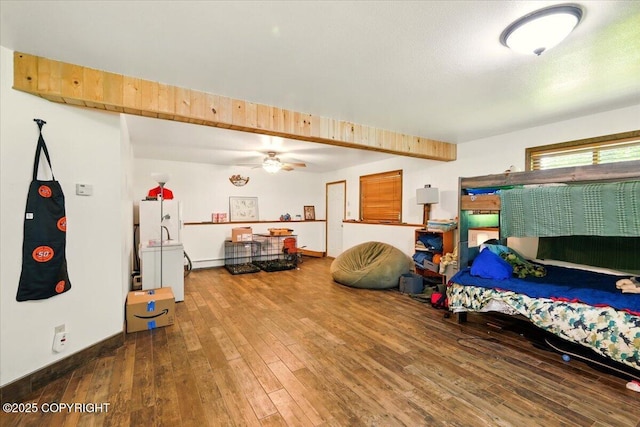 7965 S Settlers Bay Dr, Wasilla, AK 99623 - bedroom with hardwood / wood-style floors and baseboards