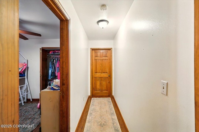 7965 S Settlers Bay Dr, Wasilla, AK 99623 - hall with wood finished floors and baseboards