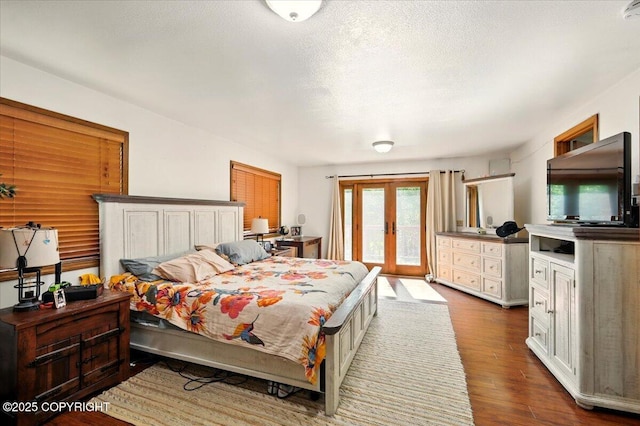 7965 S Settlers Bay Dr, Wasilla, AK 99623 - bedroom featuring french doors, access to exterior, and dark wood finished floors