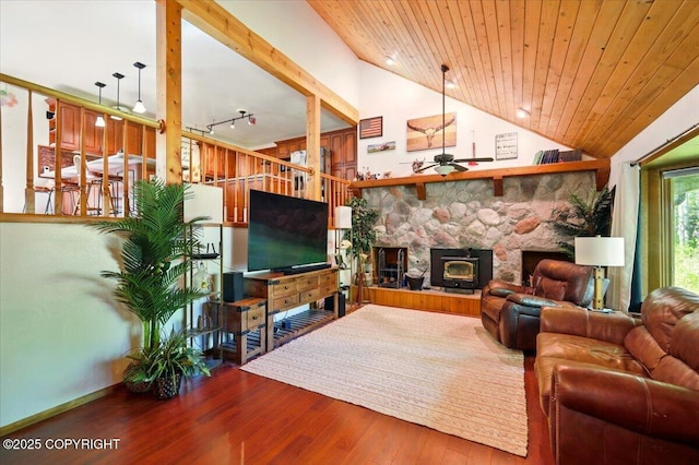 7965 S Settlers Bay Dr, Wasilla, AK 99623 - living area featuring a ceiling fan, lofted ceiling, wood finished floors, a fireplace, and wooden ceiling