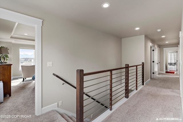 5167 E Henhouse Loop, Wasilla, AK 99654 - corridor with an upstairs landing, carpet flooring, recessed lighting, baseboards, and crown molding