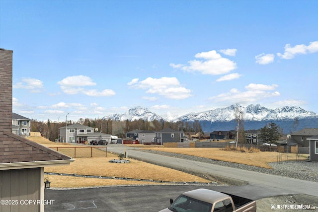 5167 E Henhouse Loop, Wasilla, AK 99654 - view of yard featuring a mountain view and a residential view