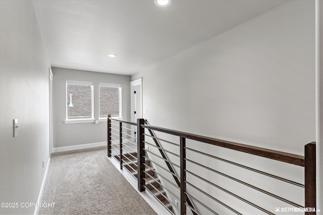 5167 E Henhouse Loop, Wasilla, AK 99654 - hall featuring an upstairs landing, carpet, baseboards, and recessed lighting