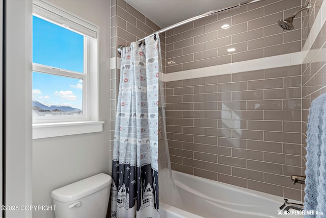 5167 E Henhouse Loop, Wasilla, AK 99654 - bathroom featuring shower / bathtub combination with curtain and toilet