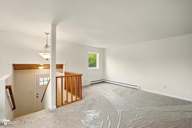 14045 W Willow Fishhook Rd, Willow, AK 99688 - carpeted empty room featuring baseboard heating and baseboards