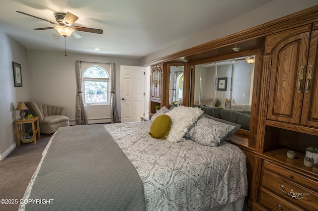 2503 Cedar St, Seward, AK 99664 - bedroom with baseboards, carpet floors, a baseboard heating unit, and ceiling fan