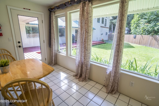 2503 Cedar St, Seward, AK 99664 - dining room with plenty of natural light and light tile patterned floors
