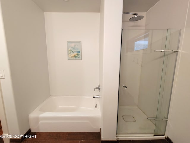 2503 Cedar St, Seward, AK 99664 - bathroom with a stall shower, wood finished floors, and a bath