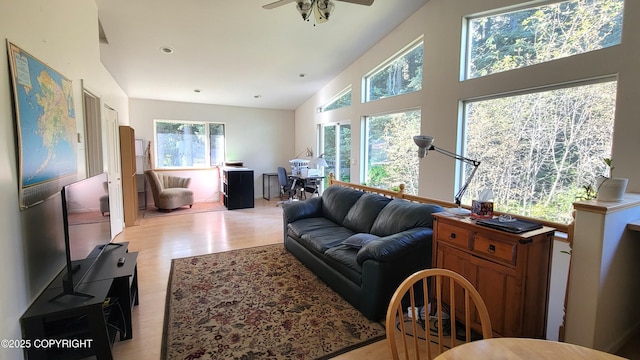 2503 Cedar St, Seward, AK 99664 - living area featuring a ceiling fan, a high ceiling, and recessed lighting