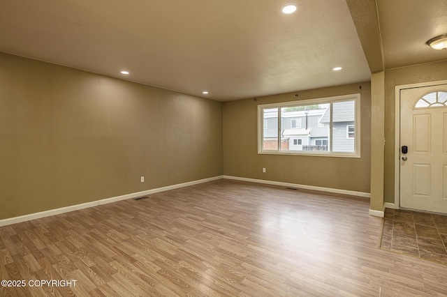 4012 Reka Dr # G5, Anchorage, AK 99508 - foyer with light wood-style flooring, recessed lighting, and baseboards