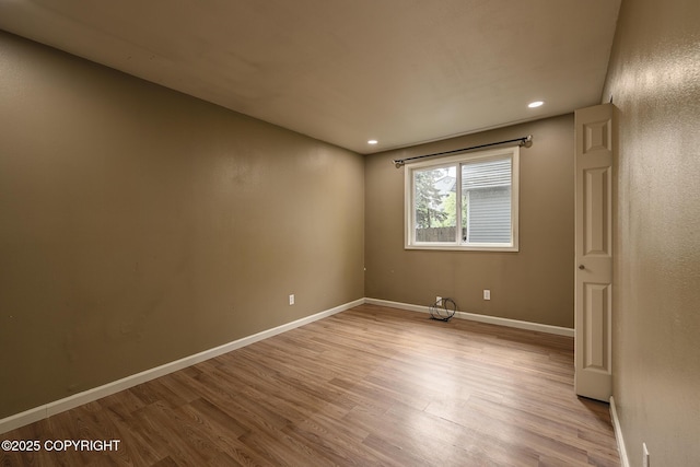 4012 Reka Dr # G5, Anchorage, AK 99508 - spare room featuring light wood-style flooring, baseboards, and recessed lighting