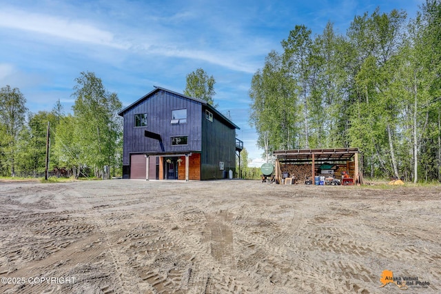 16111 E Nosey Ave, Talkeetna, AK 99676 - view of property exterior with an outbuilding