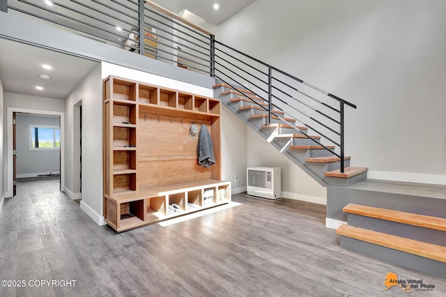 16111 E Nosey Ave, Talkeetna, AK 99676 - stairs with baseboards, wood finished floors, and recessed lighting