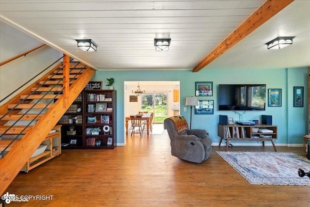 34540 Poppy Wood St, Soldotna, AK 99669 - living area with stairs, wood finished floors, a chandelier, and beamed ceiling