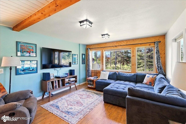 34540 Poppy Wood St, Soldotna, AK 99669 - living room with beamed ceiling and wood finished floors