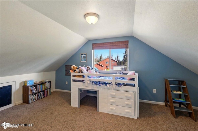 34540 Poppy Wood St, Soldotna, AK 99669 - bedroom with carpet flooring, lofted ceiling, and a textured ceiling