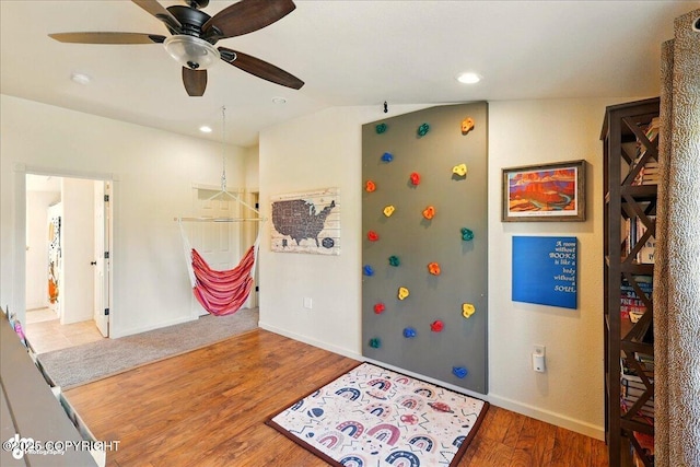 34540 Poppy Wood St, Soldotna, AK 99669 - rec room with wood finished floors, a ceiling fan, recessed lighting, and lofted ceiling