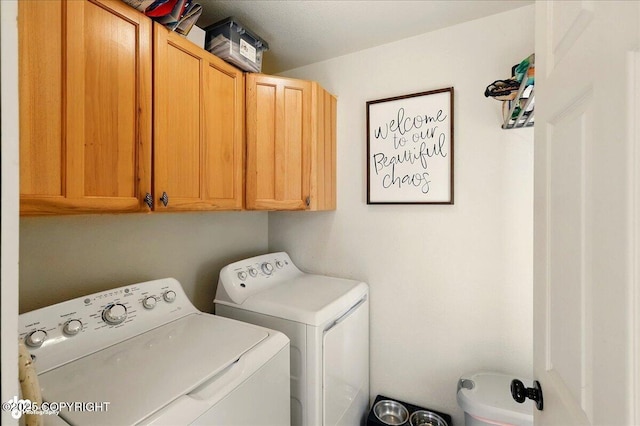 34540 Poppy Wood St, Soldotna, AK 99669 - laundry area featuring cabinet space and independent washer and dryer