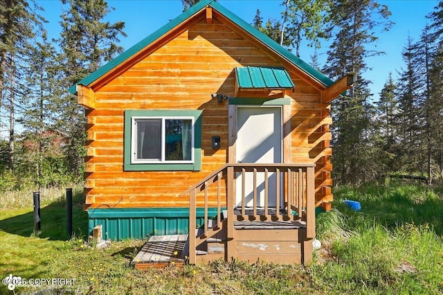 34540 Poppy Wood St, Soldotna, AK 99669 - view of front facade with log exterior