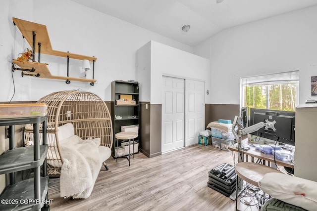4850 N Riverstone Cir, Palmer, AK 99645 - bedroom with a closet, wood finished floors, high vaulted ceiling, and a desk
