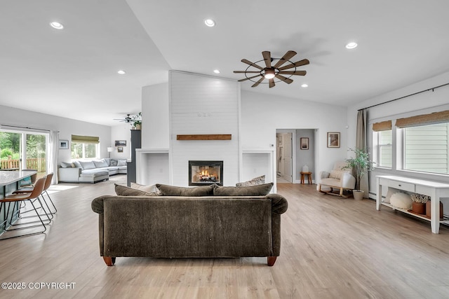 4850 N Riverstone Cir, Palmer, AK 99645 - living area featuring ceiling fan, a fireplace, light wood-style floors, recessed lighting, and lofted ceiling