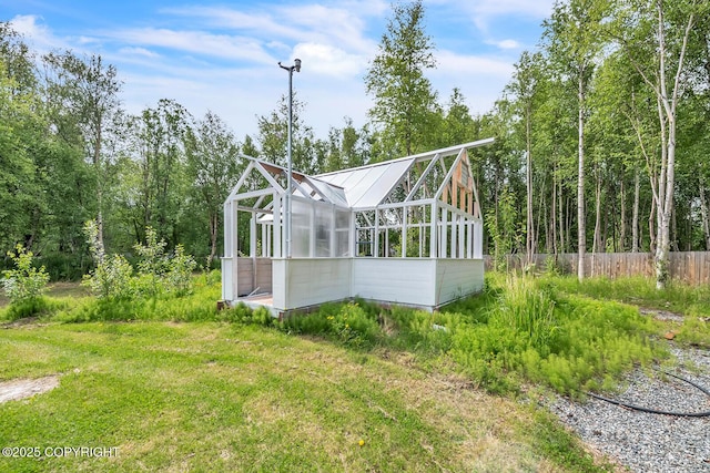 4850 N Riverstone Cir, Palmer, AK 99645 - view of side of home featuring an exterior structure, an outbuilding, and metal roof