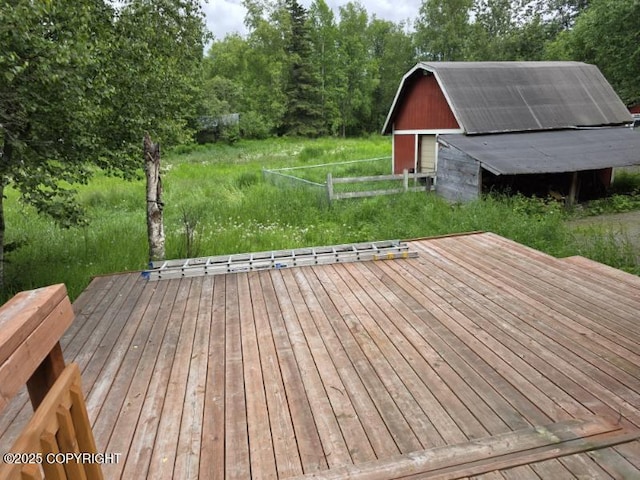 5650 N Talgach View Dr, Wasilla, AK 99654 - wooden terrace featuring an outbuilding and a barn