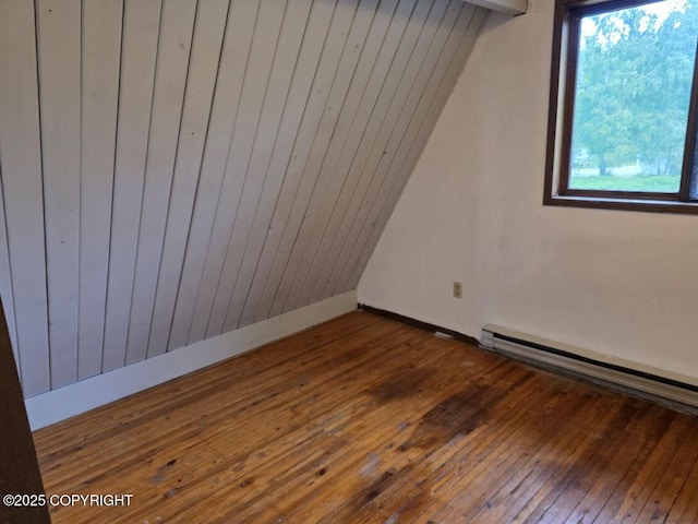 5650 N Talgach View Dr, Wasilla, AK 99654 - spare room with hardwood / wood-style flooring and a baseboard radiator