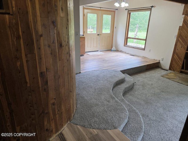 5650 N Talgach View Dr, Wasilla, AK 99654 - foyer entrance with wood finished floors and a chandelier