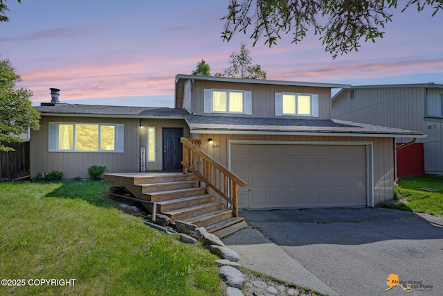 3040 Rosalind Loop, Anchorage, AK 99507 - view of front facade featuring driveway, a garage, and a shingled roof