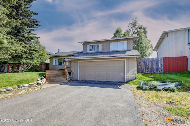 3040 Rosalind Loop, Anchorage, AK 99507 - tri-level home with driveway, an attached garage, stairway, and a shingled roof