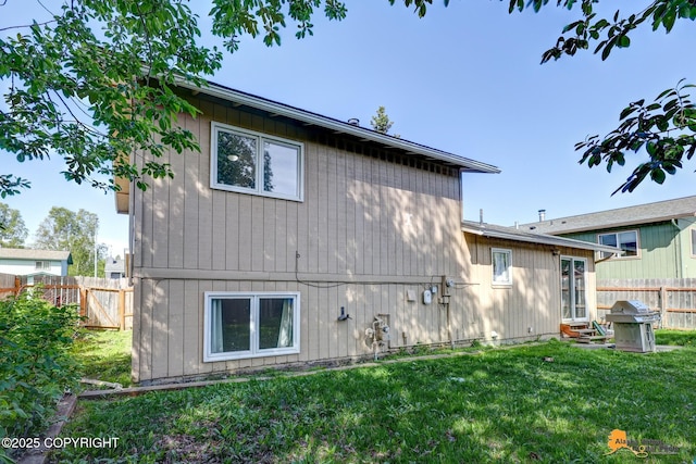3040 Rosalind Loop, Anchorage, AK 99507 - back of house featuring entry steps