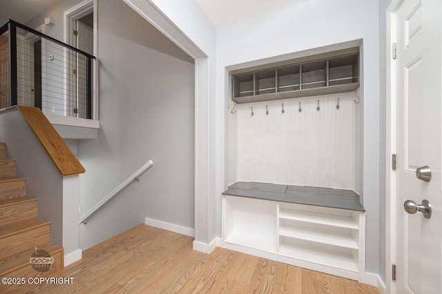 13311 Cove Cir, Anchorage, AK 99515 - mudroom featuring wood finished floors and baseboards