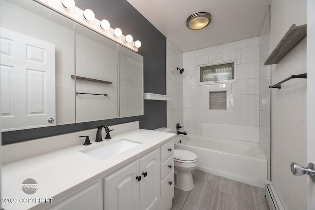 13311 Cove Cir, Anchorage, AK 99515 - bathroom with vanity, shower / tub combination, and a baseboard heating unit