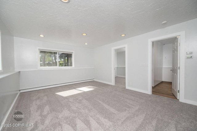 13311 Cove Cir, Anchorage, AK 99515 - unfurnished bedroom with a baseboard radiator, carpet floors, recessed lighting, and a textured ceiling