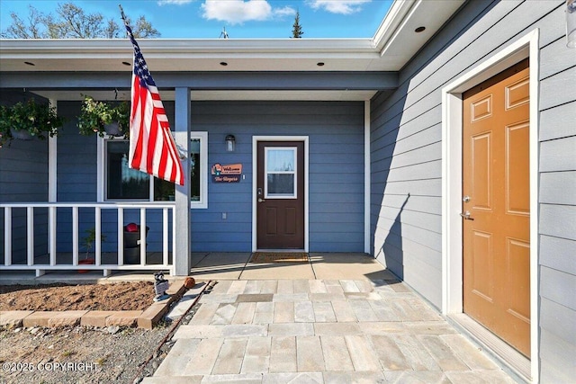 47974 Barney Ct, Soldotna, AK 99669 - view of exterior entry with covered porch