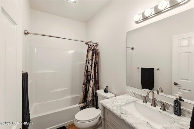 47974 Barney Ct, Soldotna, AK 99669 - bathroom featuring vanity, shower / tub combo, and toilet
