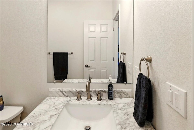 47974 Barney Ct, Soldotna, AK 99669 - bathroom with vanity and toilet